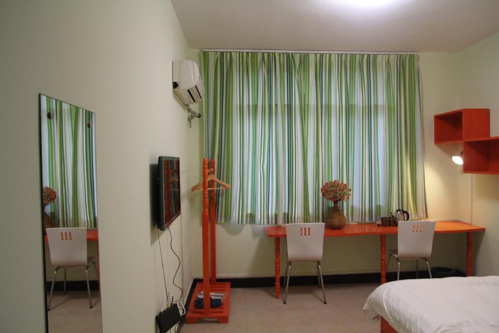 Tiffany Hostel Yangshuo Rom bilde